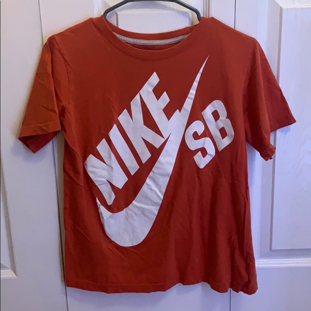 orange nike shirt